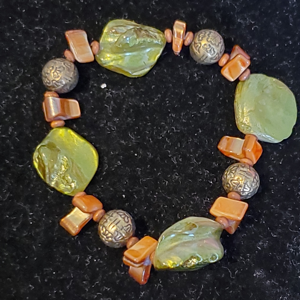 Green and brown shell look beads stretch bracelet